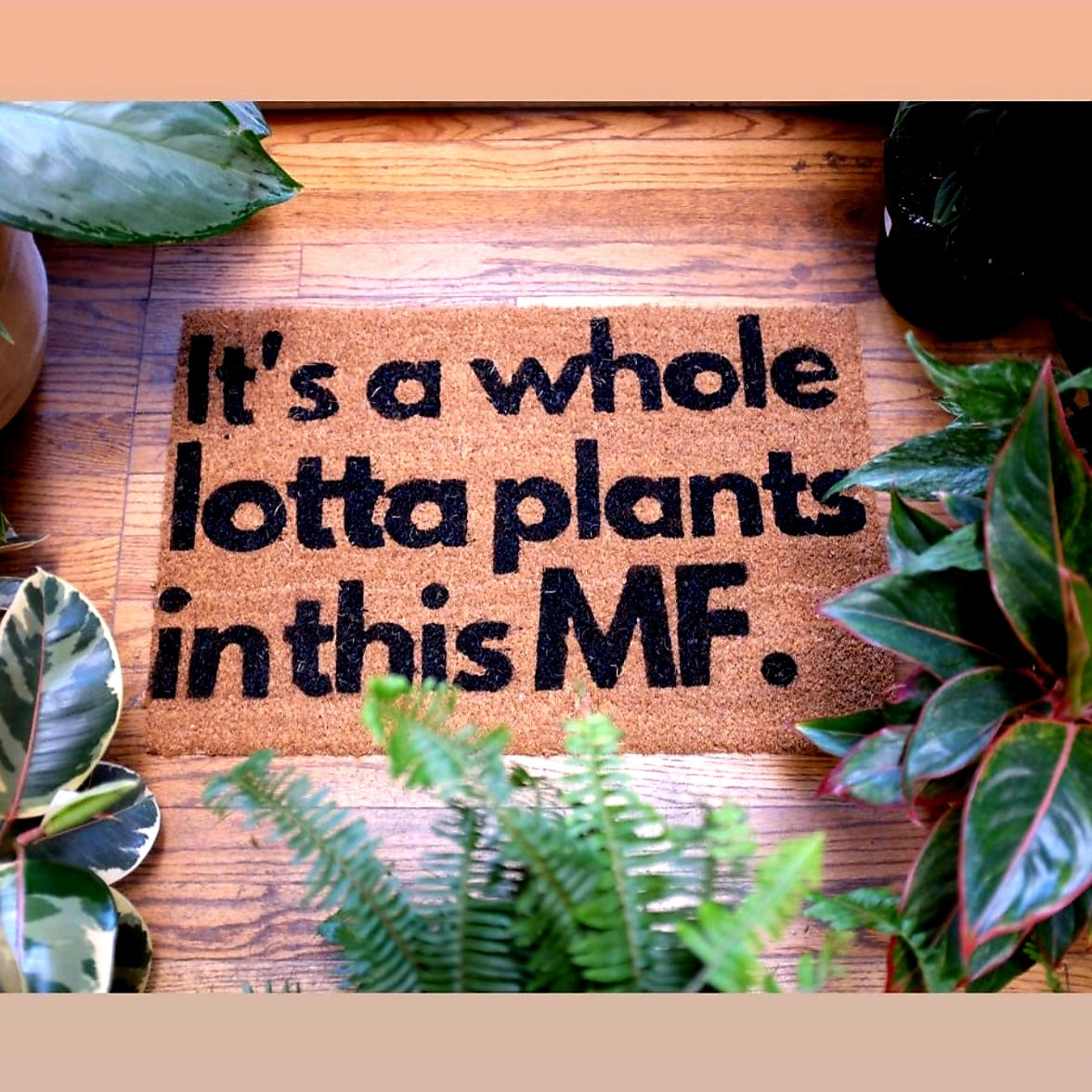 It's a whole lotta plants in this MF coir doormat